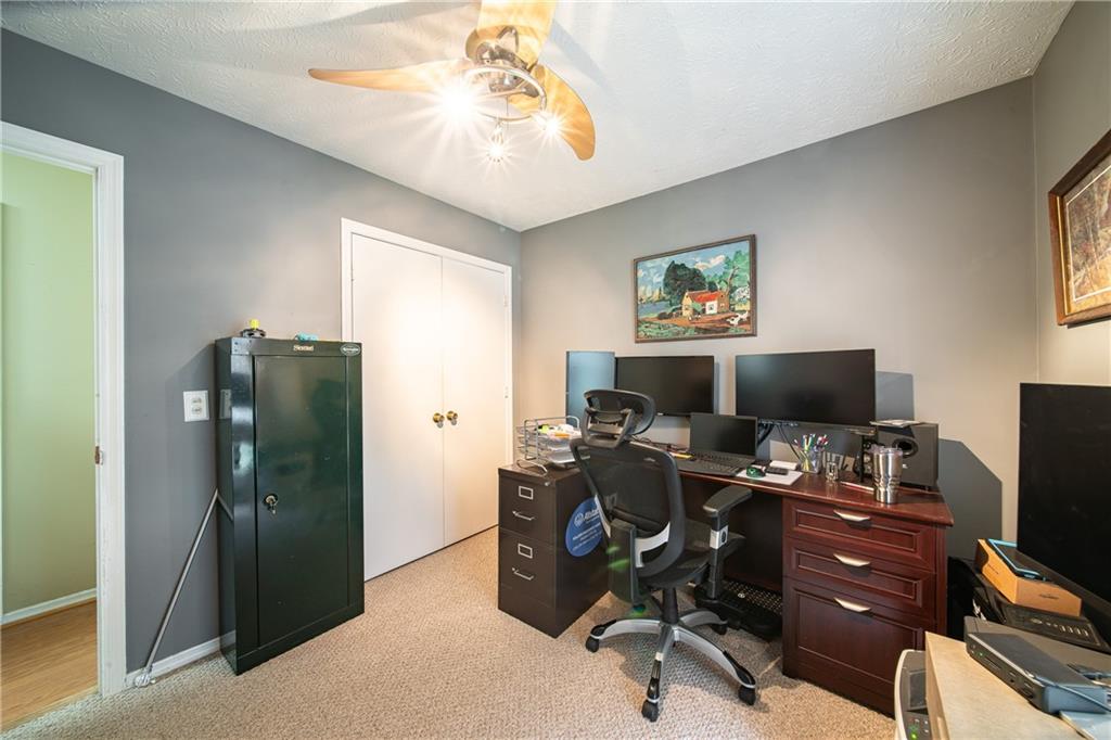 143 Lee Road 979 Phenix City, AL 36870 - Photo 31 of 37 Carpeted office space featuring ceiling fan and a textured ceiling