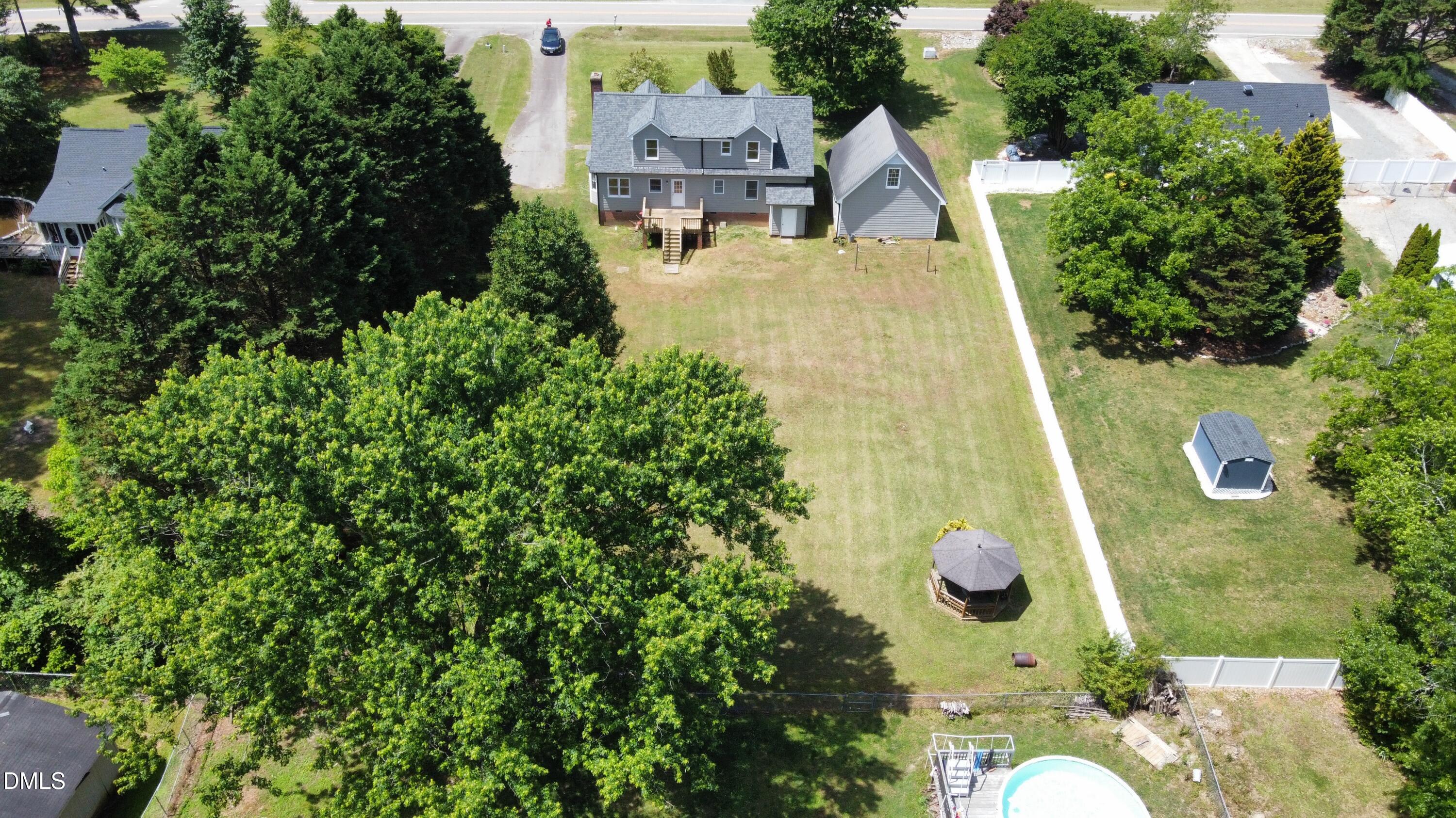 10917 Fanny Brown Road Raleigh, NC 27603 - Photo 52 of 54 an aerial view of a house with swimming pool