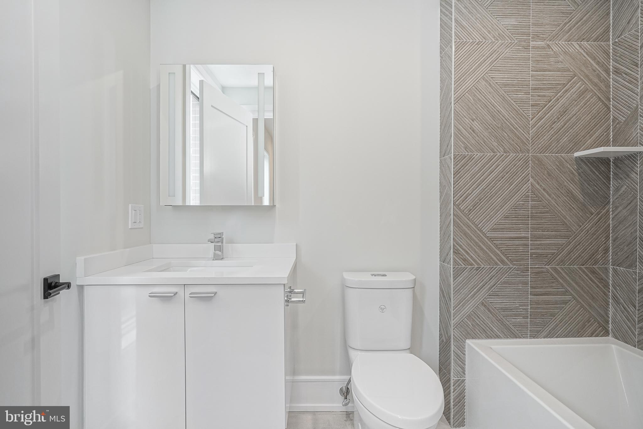 2002 Renaissance Walk, Unit 2 Philadelphia, PA 19145 - Photo 37 of 66 Porcelanosa tile is