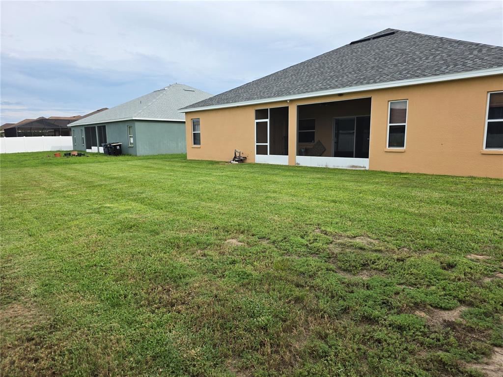 2850 Sheldon Street Lakeland, FL 33813 - Photo 7 of 23 a front view of house with yard and porch