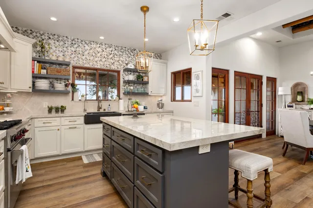 a bed room with bed and a flat screen tv