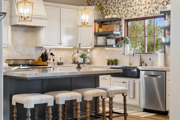 a bedroom with a bed and a television