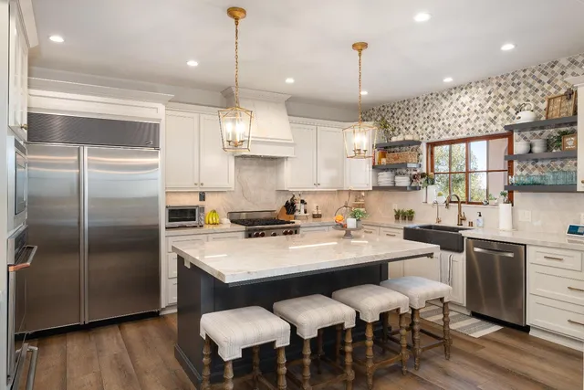 a bathroom with a sink a bathtub and a shower
