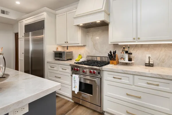 a view of a swimming pool with an outdoor space and seating area