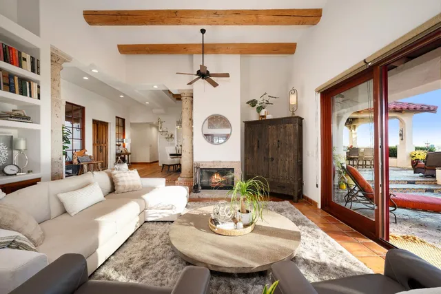 a view of parking garage with cars parked