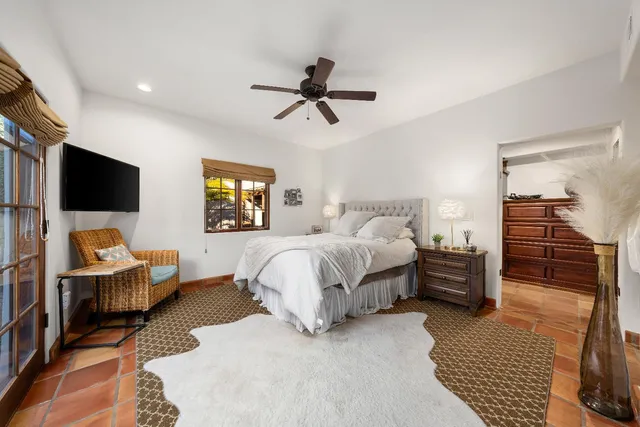 a view of a yard with large trees