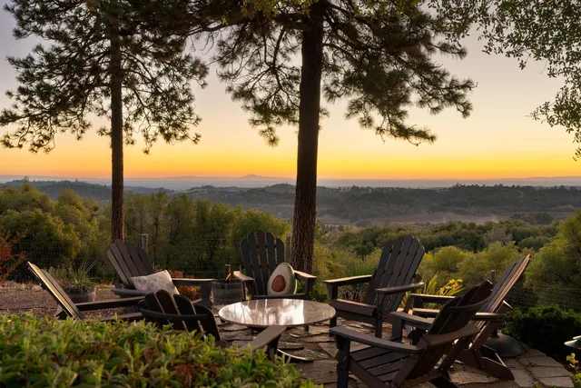 a view of a road with a building in the background