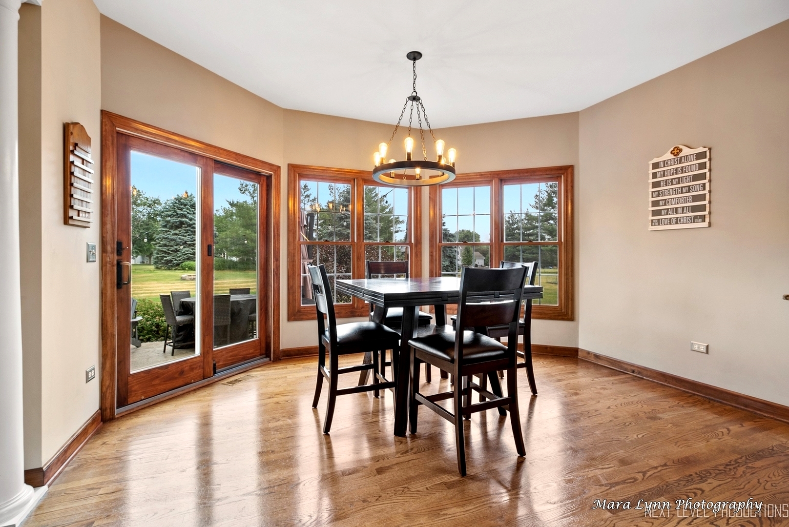 7N265 Ridge Line Road St. Charles, IL 60175 - Photo 11 of 46 a dining room with furniture window wooden floor and a chandelier