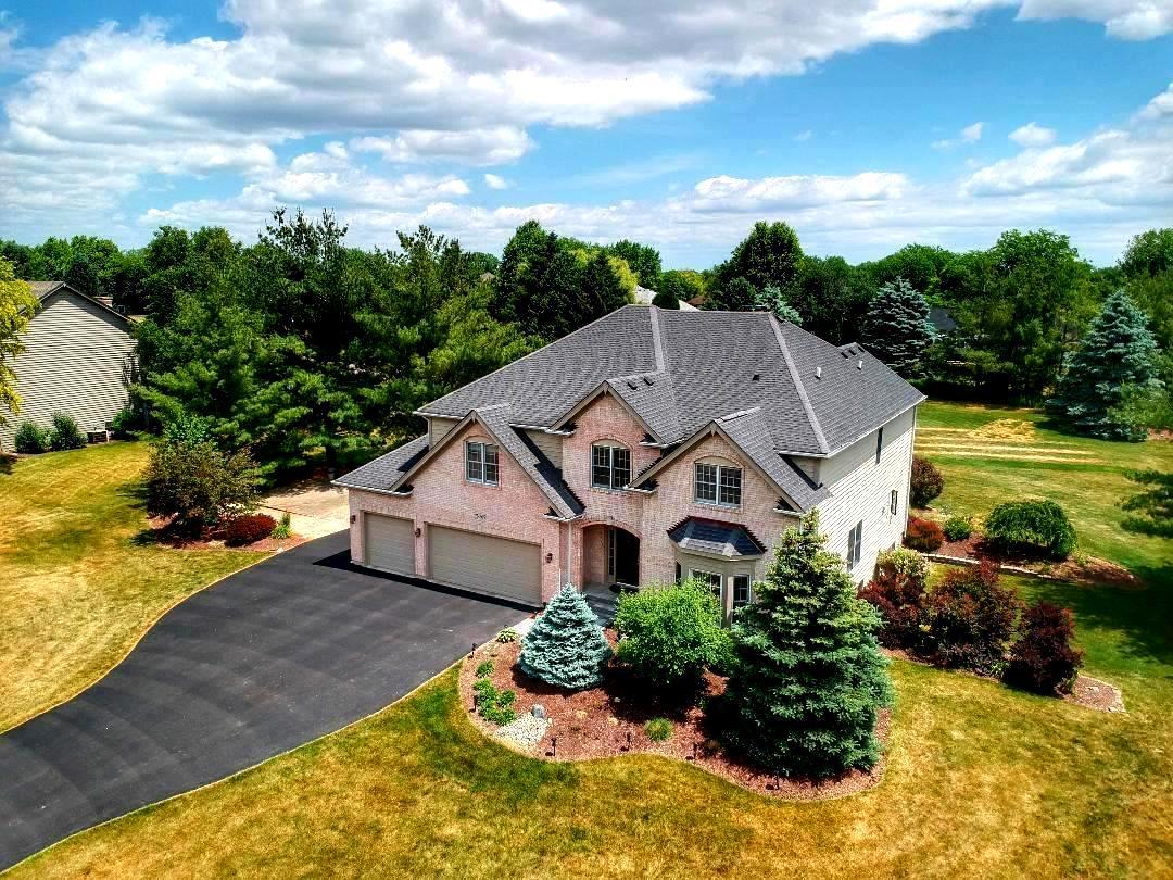 7N265 Ridge Line Road St. Charles, IL 60175 - Photo 2 of 46 a aerial view of a house with a yard