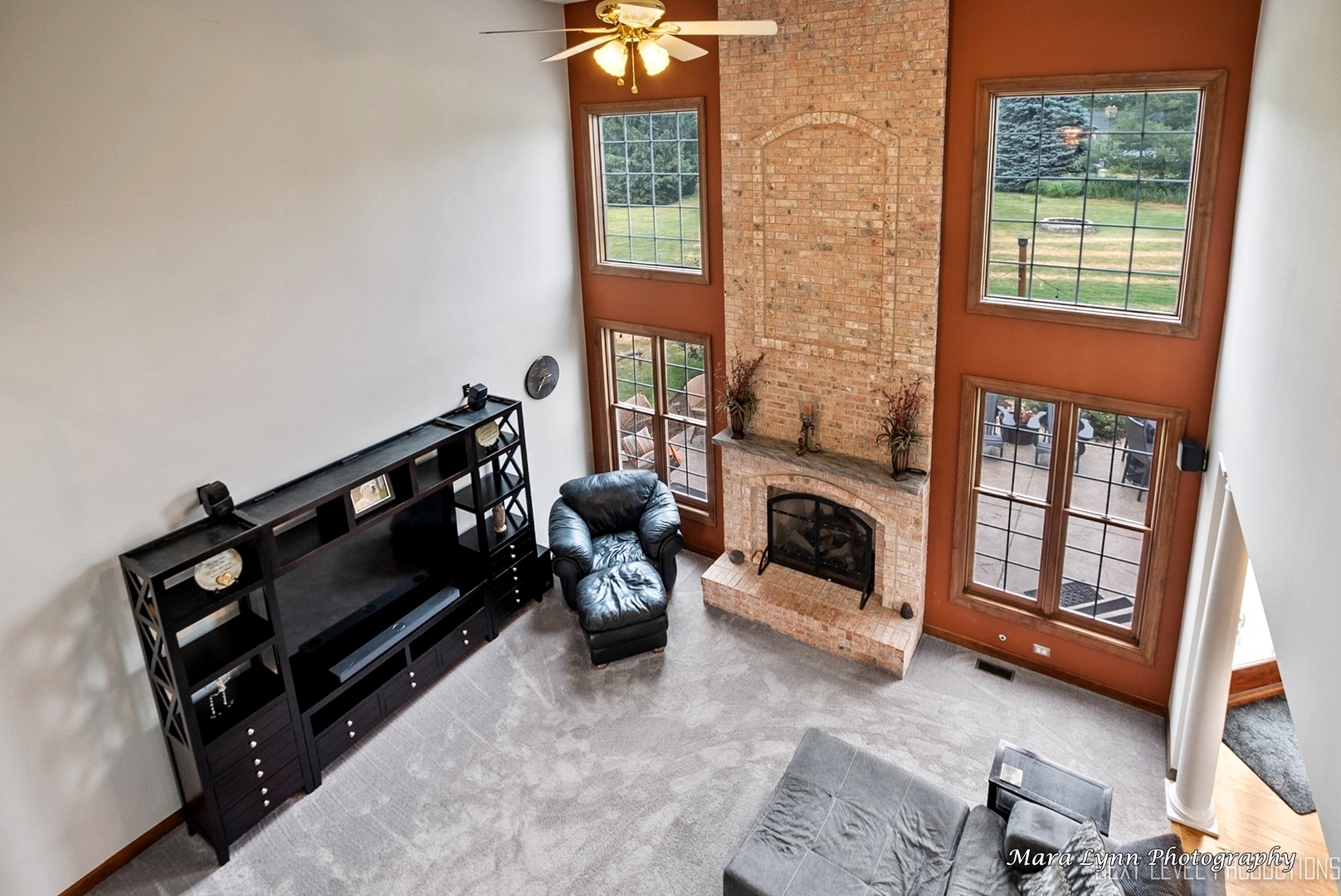 7N265 Ridge Line Road St. Charles, IL 60175 - Photo 22 of 46 a living room with furniture and a fireplace