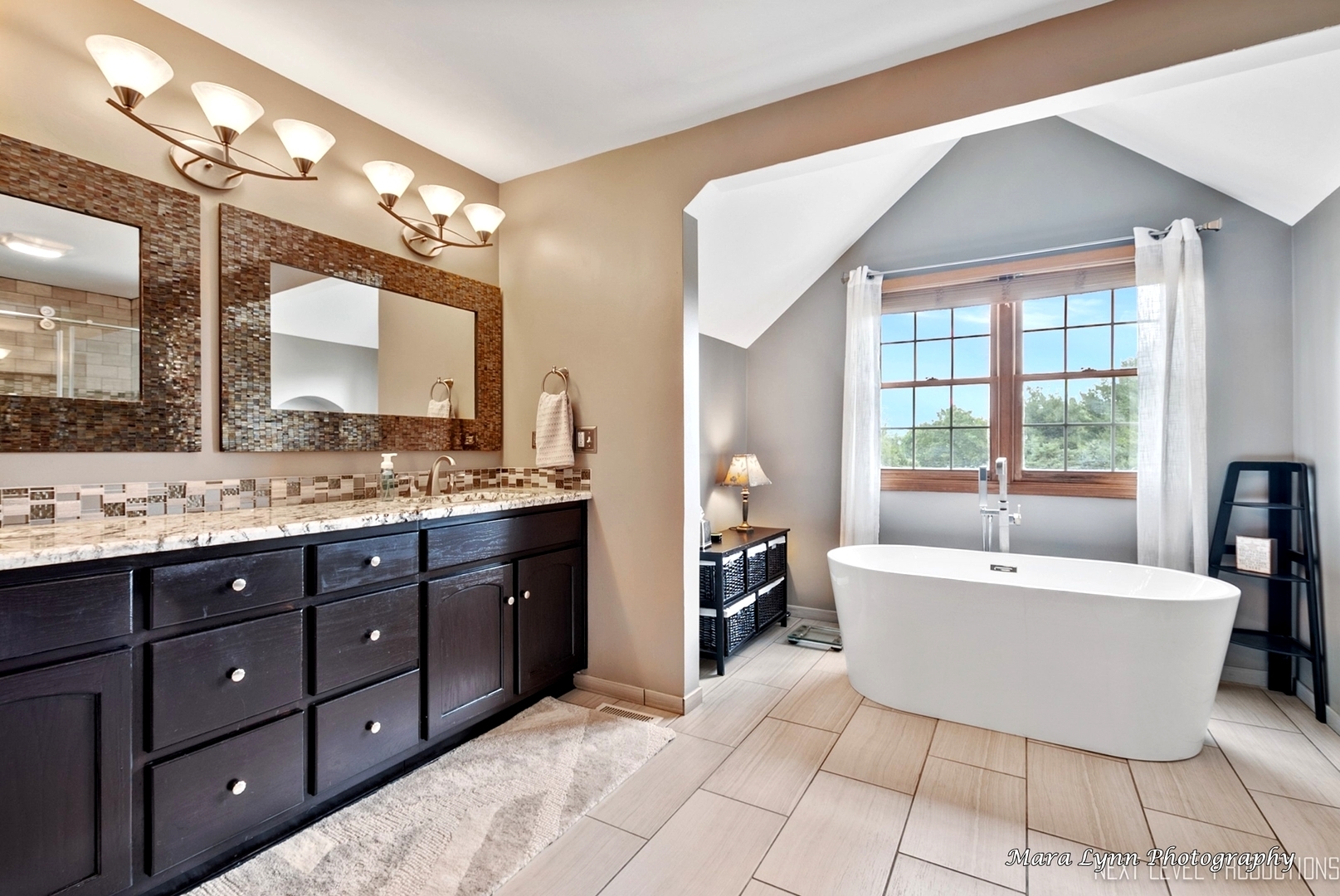 7N265 Ridge Line Road St. Charles, IL 60175 - Photo 27 of 46 a spacious bathroom with a tub sink double vanity and mirror