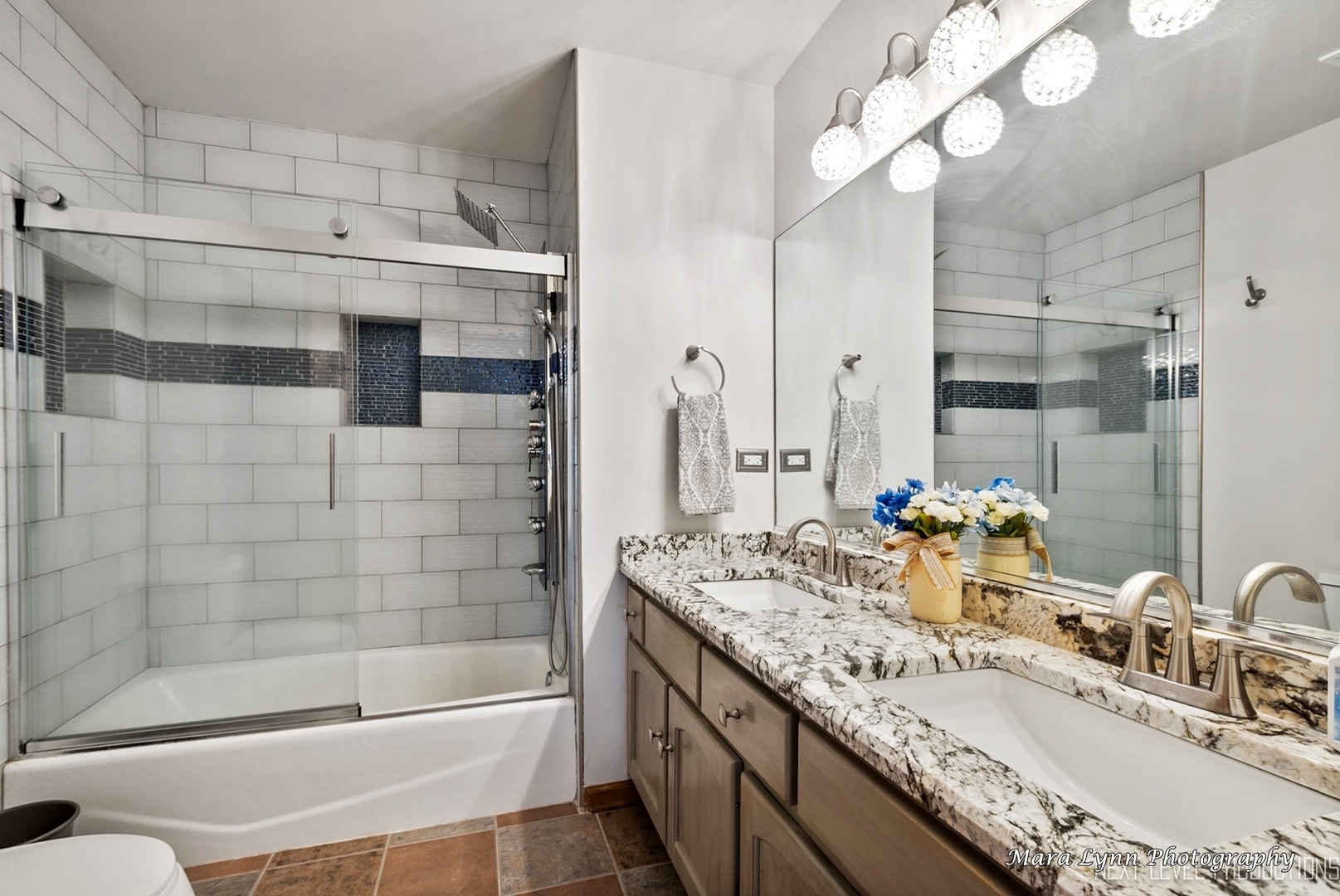 7N265 Ridge Line Road St. Charles, IL 60175 - Photo 32 of 46 a bathroom with a granite countertop sink a mirror and shower