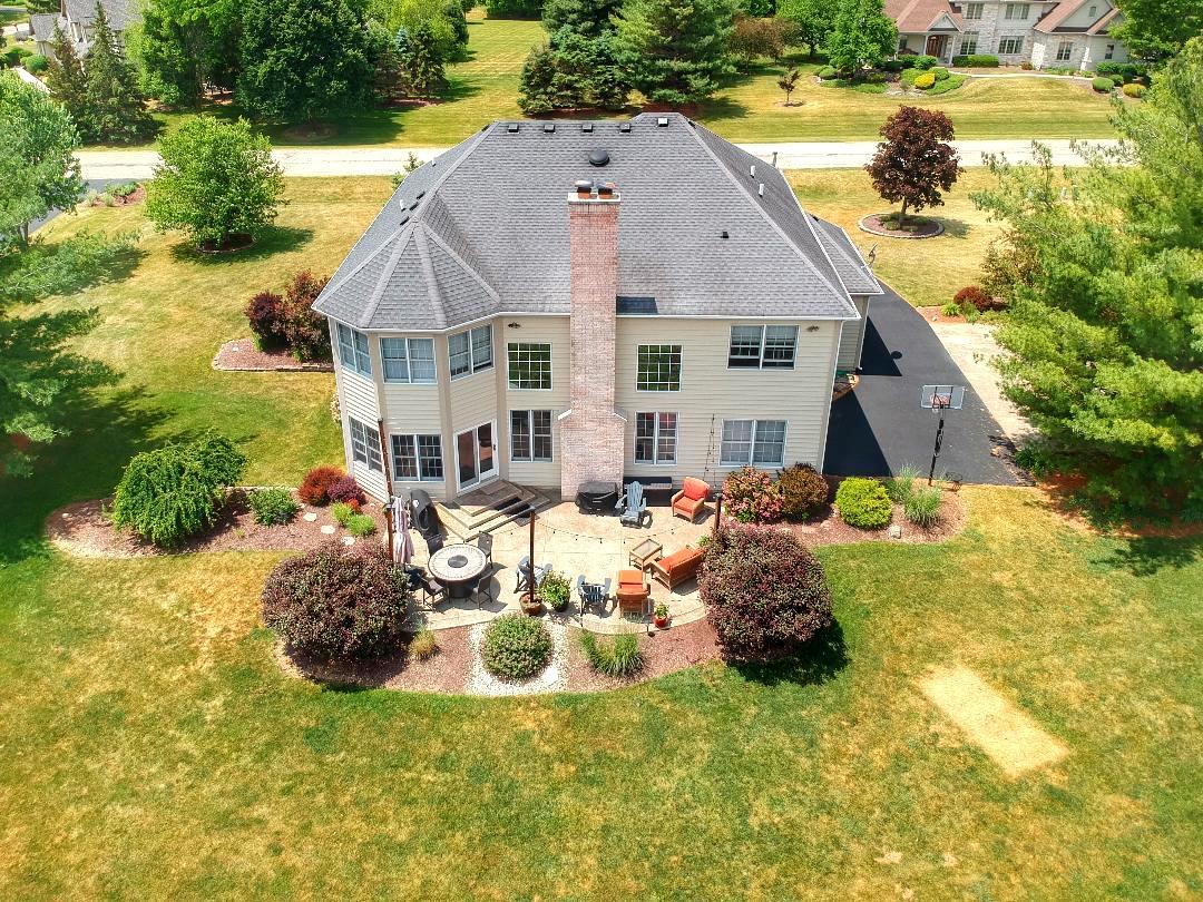 7N265 Ridge Line Road St. Charles, IL 60175 - Photo 43 of 46 a view of a house with backyard sitting area and swimming pool