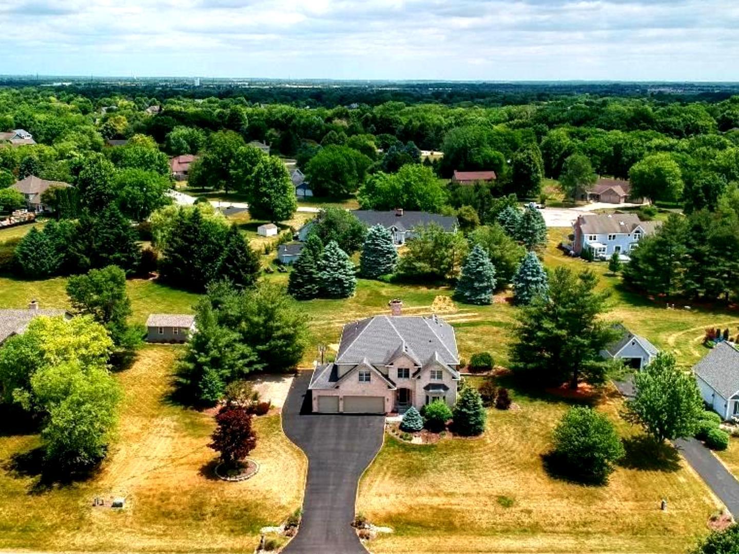 7N265 Ridge Line Road St. Charles, IL 60175 - Photo 45 of 46 an aerial view of a house with yard swimming pool and outdoor seating