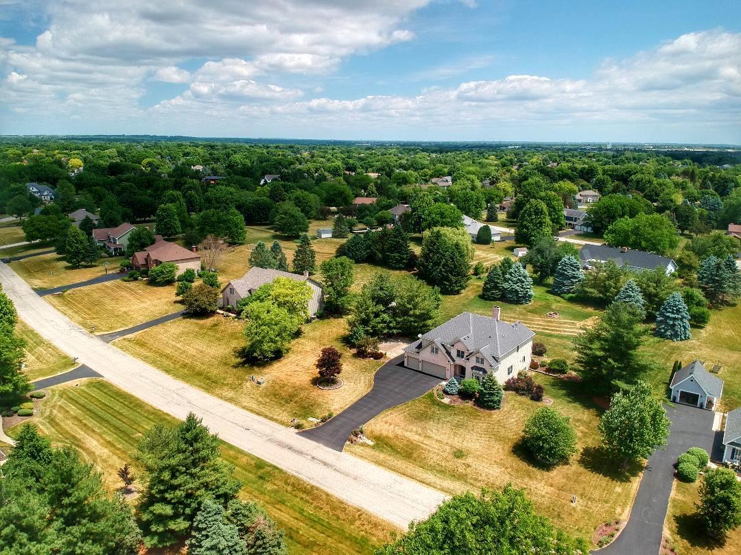 7N265 Ridge Line Road St. Charles, IL 60175 - Photo 46 of 46 an aerial view of a house with a yard