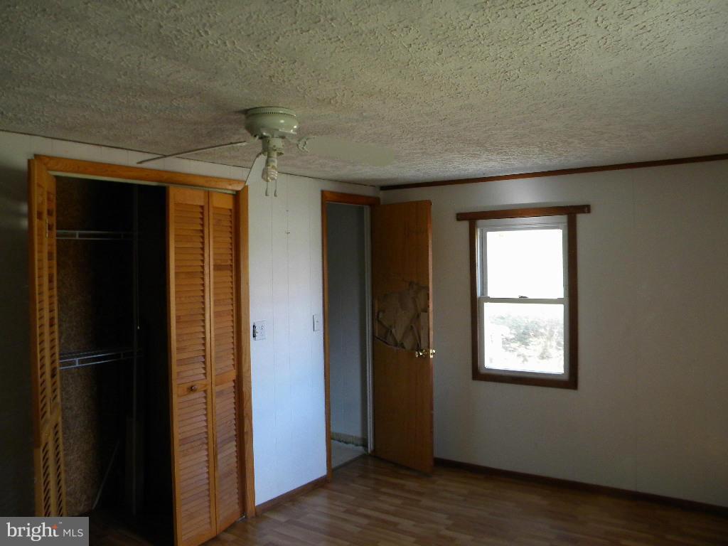 1966 Hutton Road Oakland, MD 21550 - Photo 10 of 24 an empty room with windows