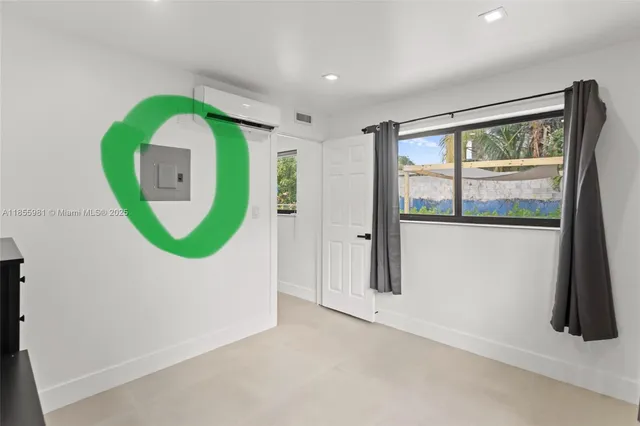 a view of a livingroom with a large window