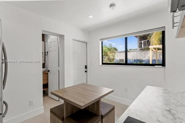 a workspace with furniture and window