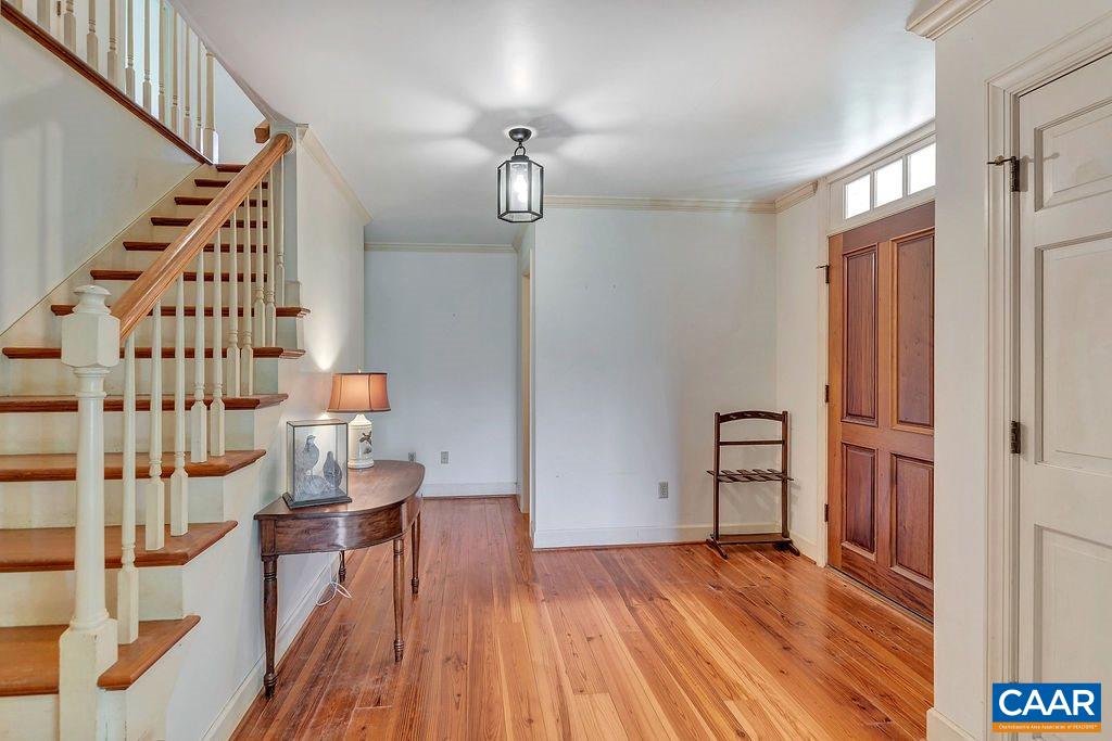 674 Gillums Ridge Road Charlottesville, VA 22903 - Photo 11 of 50 wooden floor in an empty room with a window