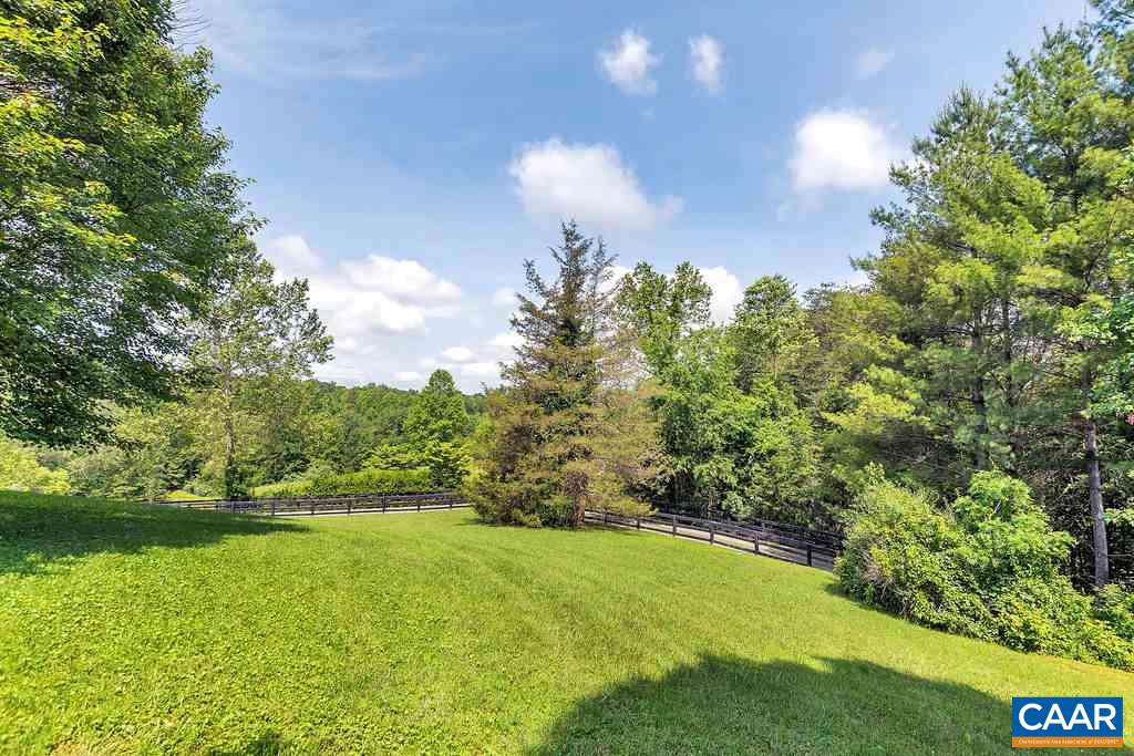 674 Gillums Ridge Road Charlottesville, VA 22903 - Photo 39 of 50 a view of a big yard with swimming pool and green space