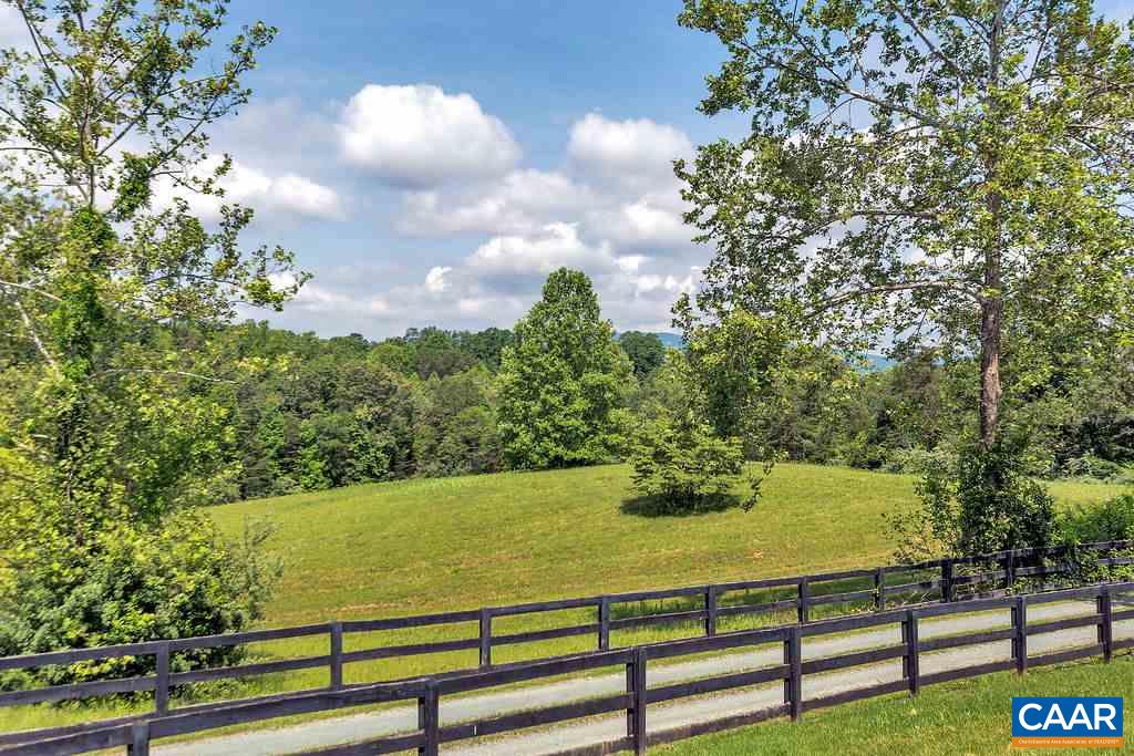 674 Gillums Ridge Road Charlottesville, VA 22903 - Photo 44 of 50 a view of a yard with an outdoor seating