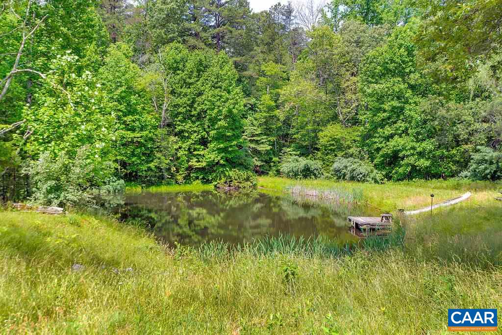 674 Gillums Ridge Road Charlottesville, VA 22903 - Photo 45 of 50 a view of a lake view with a garden