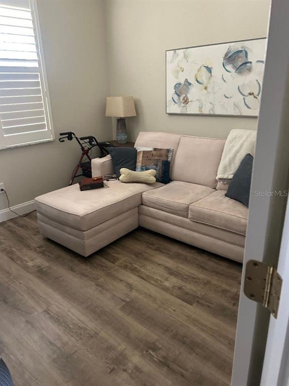 940 Cooper Street, Unit 302 Venice, FL 34285 - Photo 14 of 28 a living room with furniture