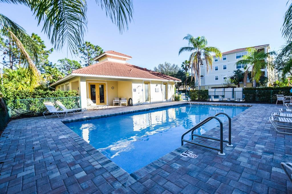 940 Cooper Street, Unit 302 Venice, FL 34285 - Photo 17 of 28 a view of a house with backyard and sitting area