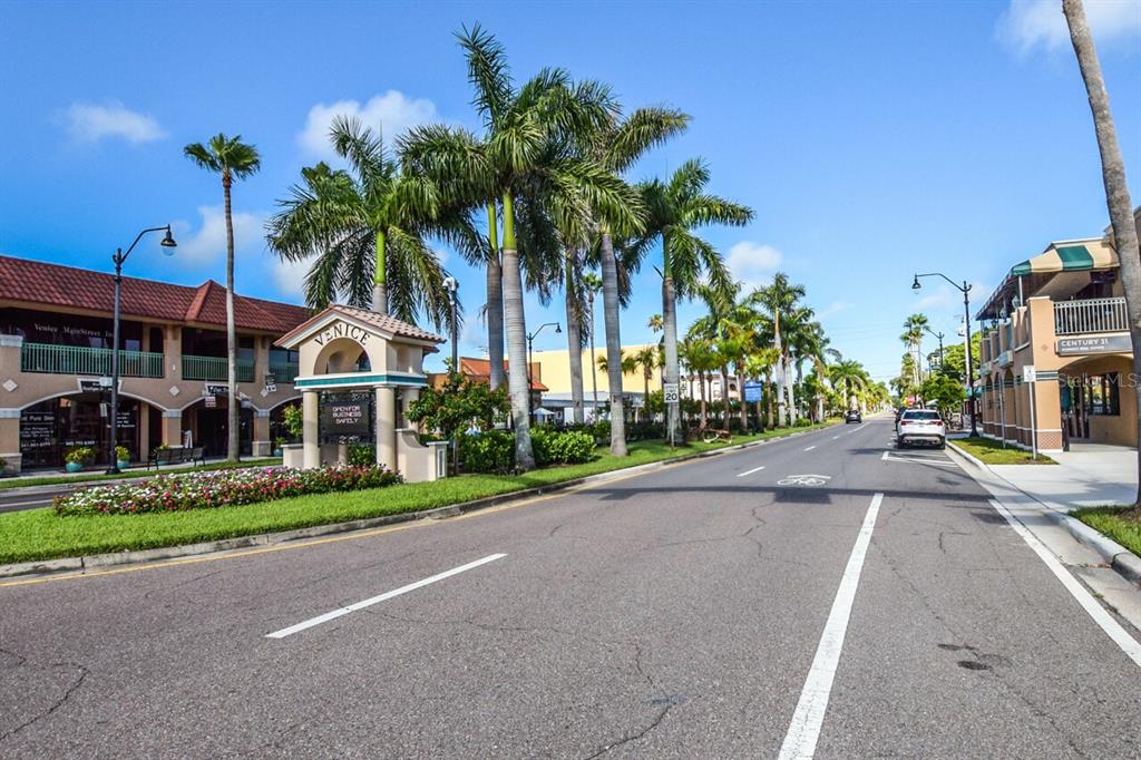 940 Cooper Street, Unit 302 Venice, FL 34285 - Photo 19 of 28 a view of street along with palm trees