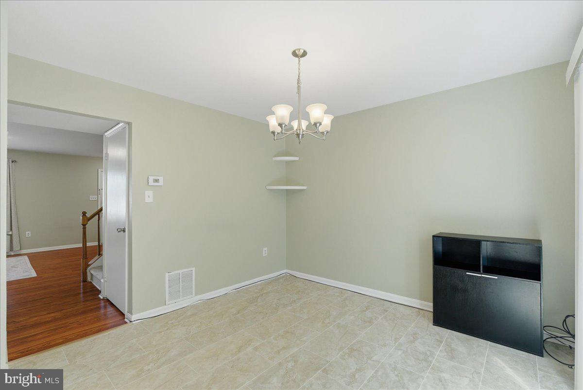 8582 Adamson Street Manassas, VA 20110 - Photo 11 of 24 a view of livingroom with hallway