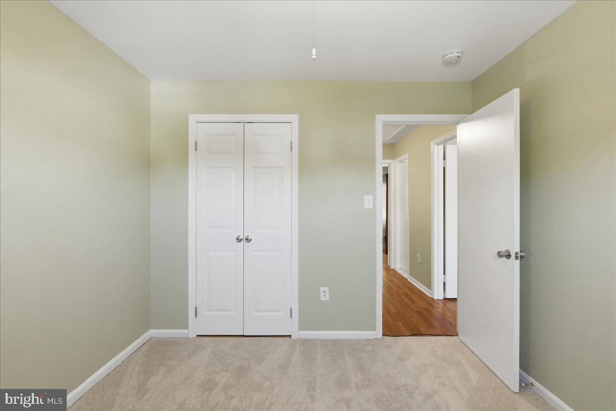 8582 Adamson Street Manassas, VA 20110 - Photo 22 of 24 a view of an empty room