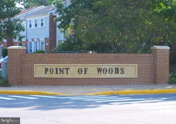 8582 Adamson Street Manassas, VA 20110 - Photo 24 of 24 a sign that is on the side of a building