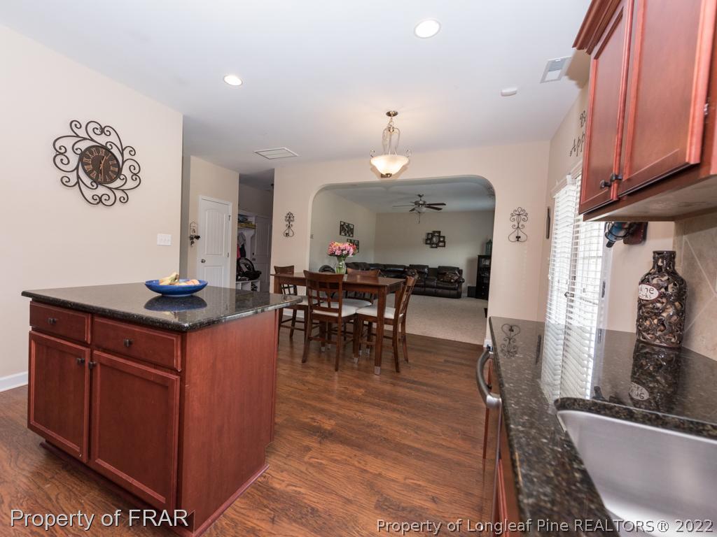 717 St Johns Loop Raeford, NC 28376 - Photo 11 of 29 a view of dining table chairs and entryway