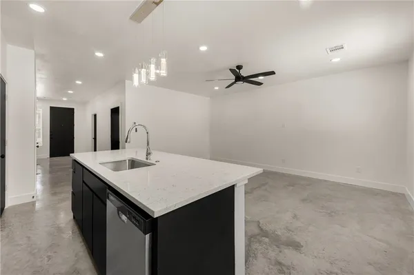 wooden floor in a room with a sink