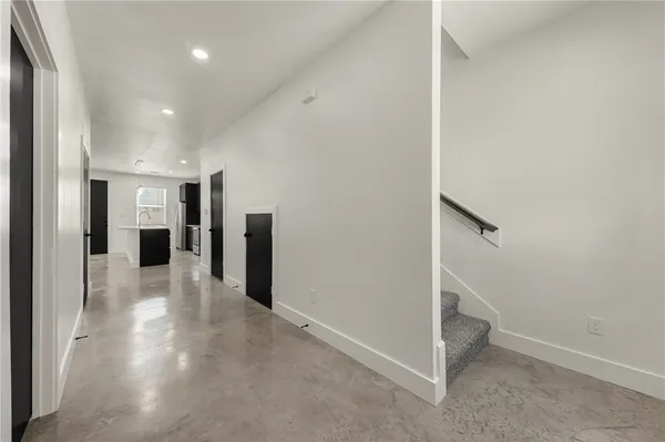 a view of a hallway with closet