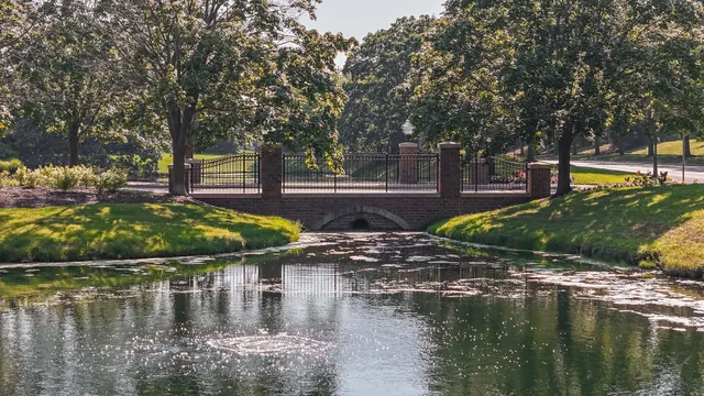 a view of swimming pool with a yard