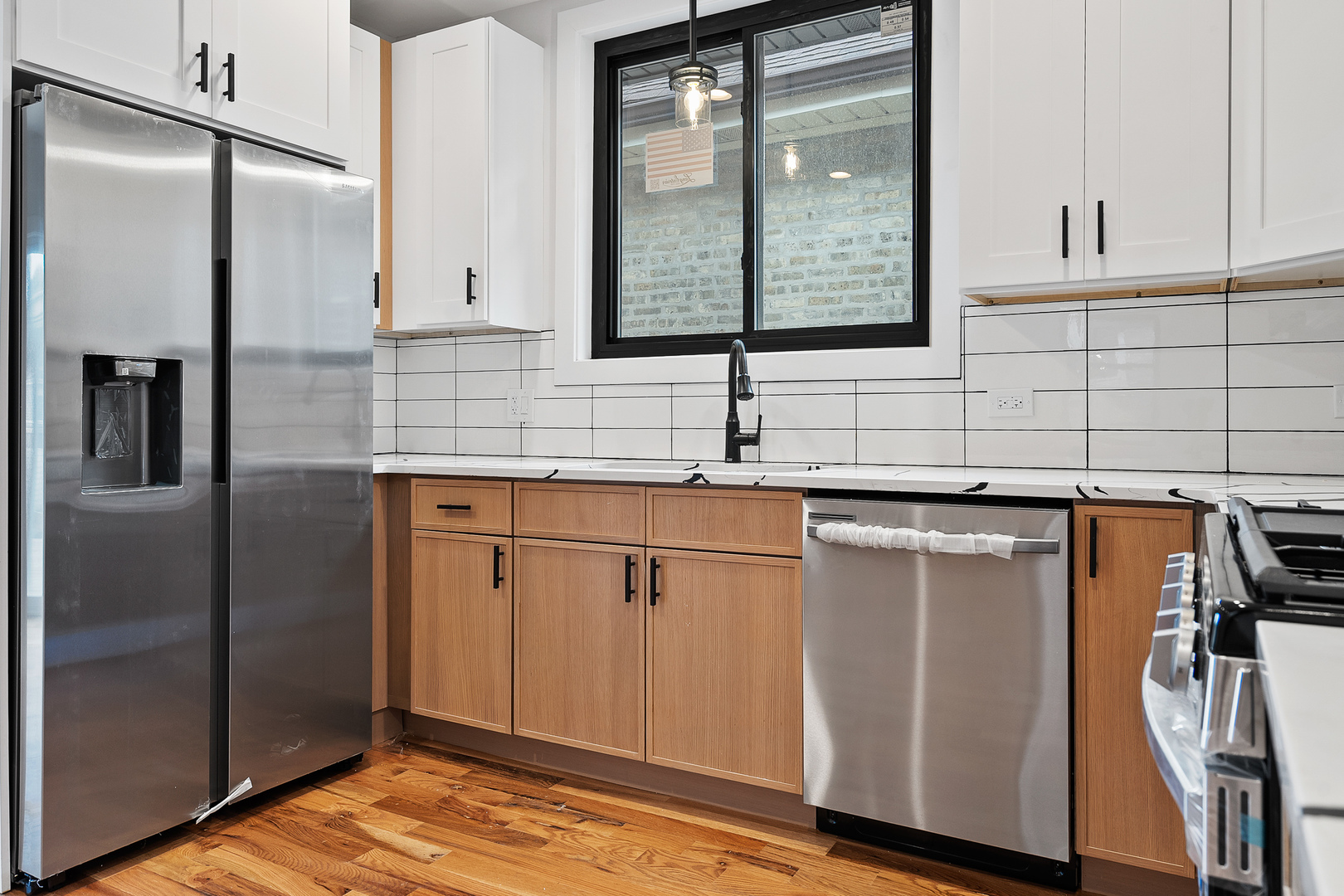 3529 North Nottingham Avenue Chicago, IL 60634 - Photo 11 of 33 a kitchen with stainless steel appliances granite countertop a refrigerator and a sink