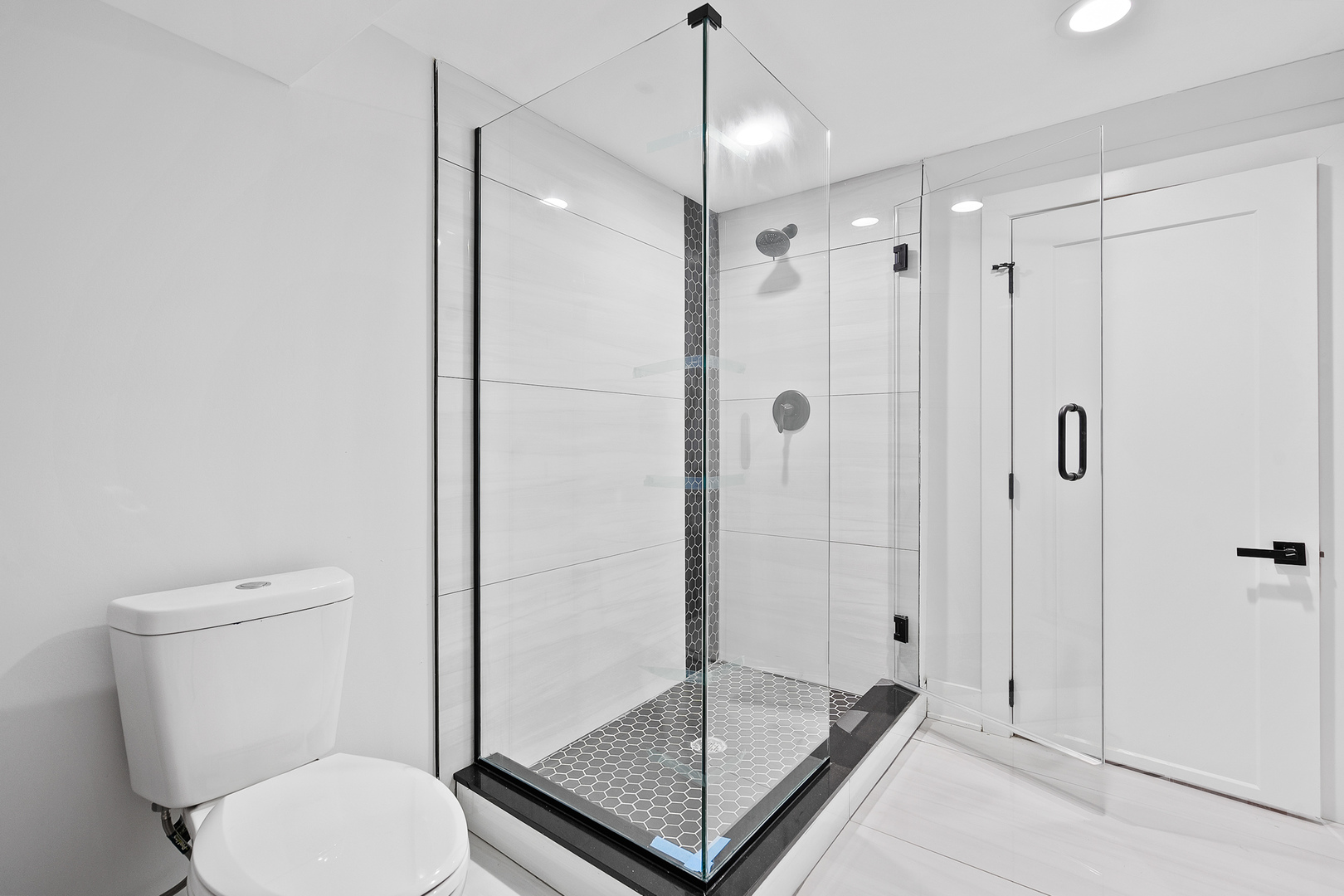 3529 North Nottingham Avenue Chicago, IL 60634 - Photo 33 of 33 a bathroom with a shower a toilet and a sink