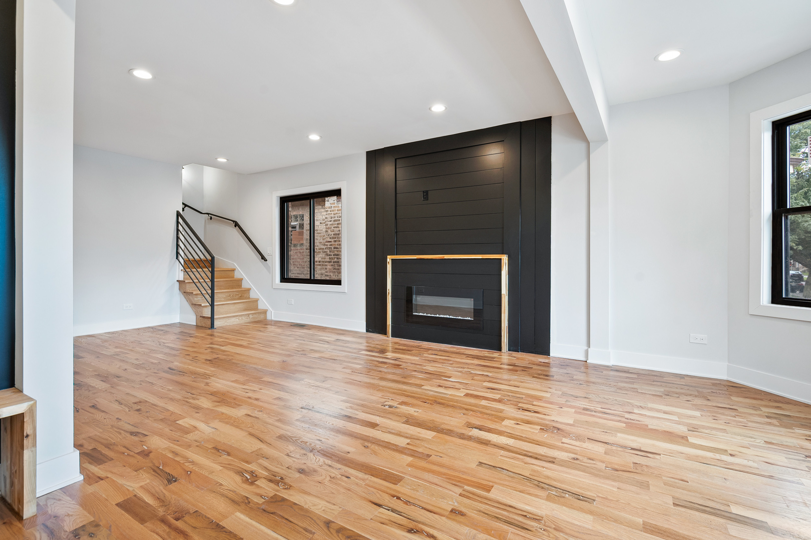 3529 North Nottingham Avenue Chicago, IL 60634 - Photo 4 of 33 a view of an empty room with wooden floor and a window