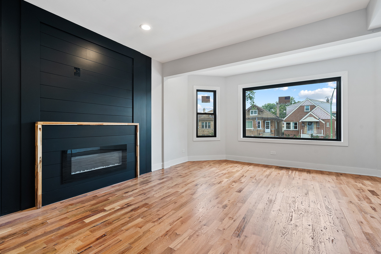 3529 North Nottingham Avenue Chicago, IL 60634 - Photo 6 of 33 a bedroom with a bed and a fireplace