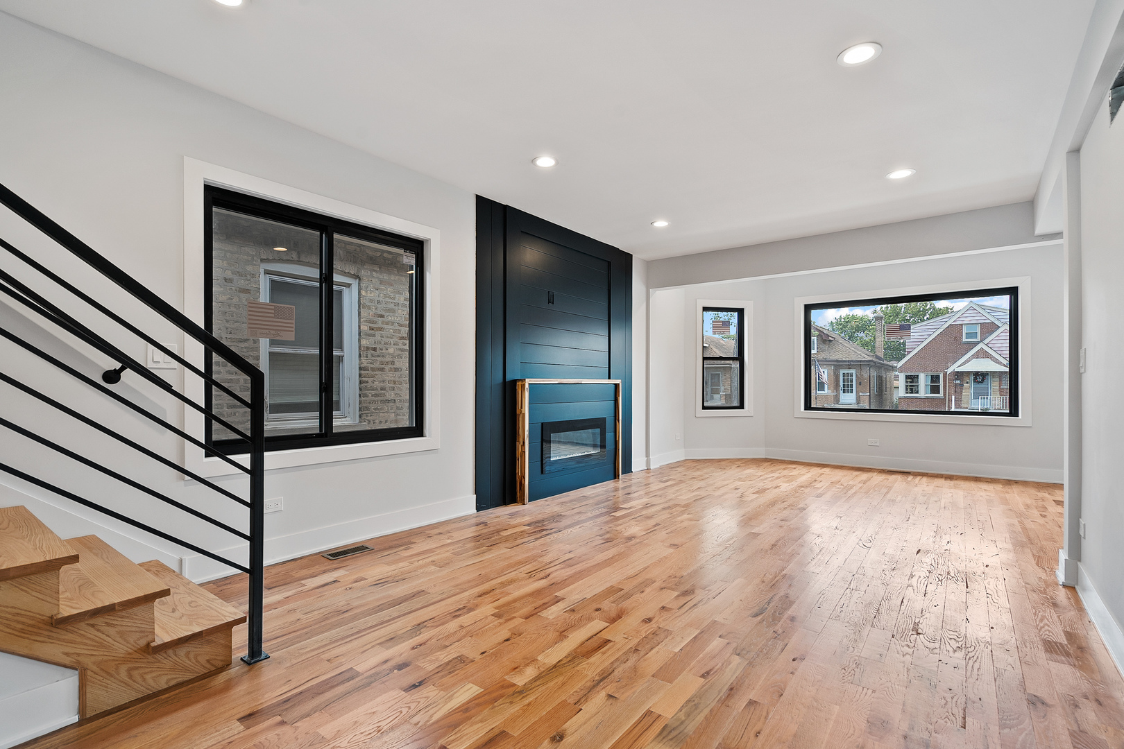 3529 North Nottingham Avenue Chicago, IL 60634 - Photo 7 of 33 a view of an empty room with wooden floor and a window