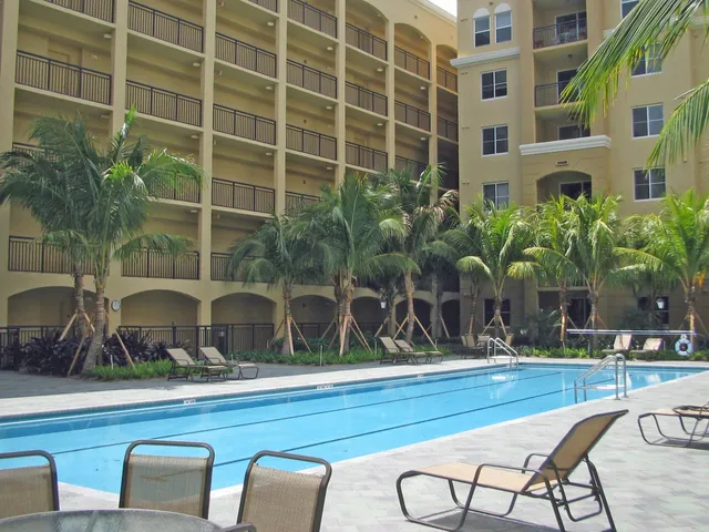 a view of a chairs and table in a patio