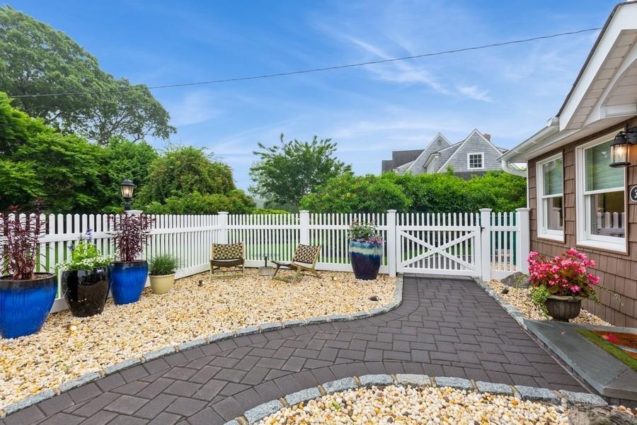 3 Dock Road Remsenburg, NY 11960 - Photo 1 of 1 View of patio / terrace featuring a gate