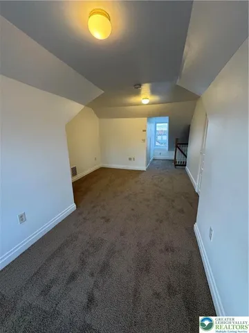 a view of a livingroom with a fireplace