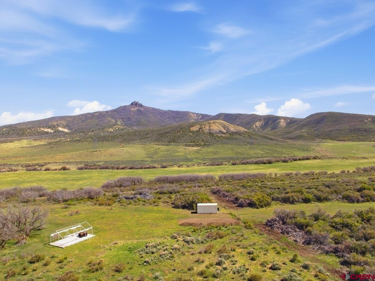 8896 8250th Road Crawford, CO 81415 - Photo 15 of 37 a view of an ocean and a mountain