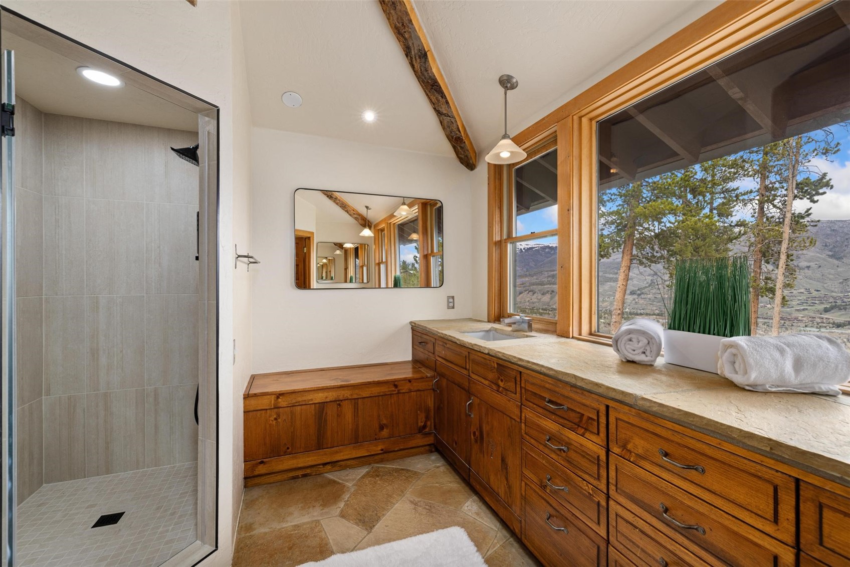 983 Emerald Road Silverthorne, CO 80498 - Photo 15 of 45 Primary bathroom with large windows, spectactular views, and great privacy.