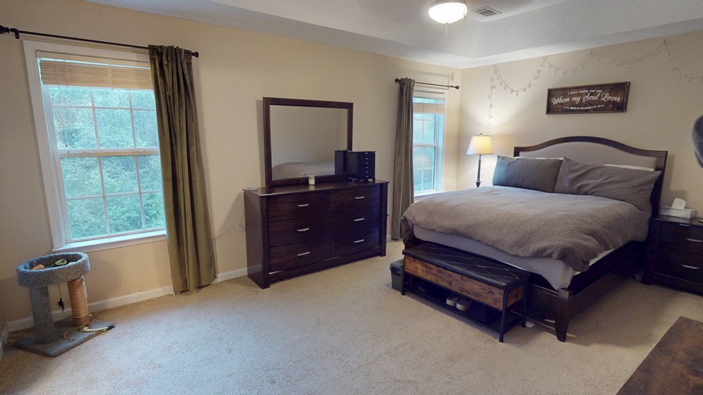 5260 Kingsberry Lane Columbus, GA 31907 - Photo 15 of 23 a bedroom with a bed and a dresser next to a window
