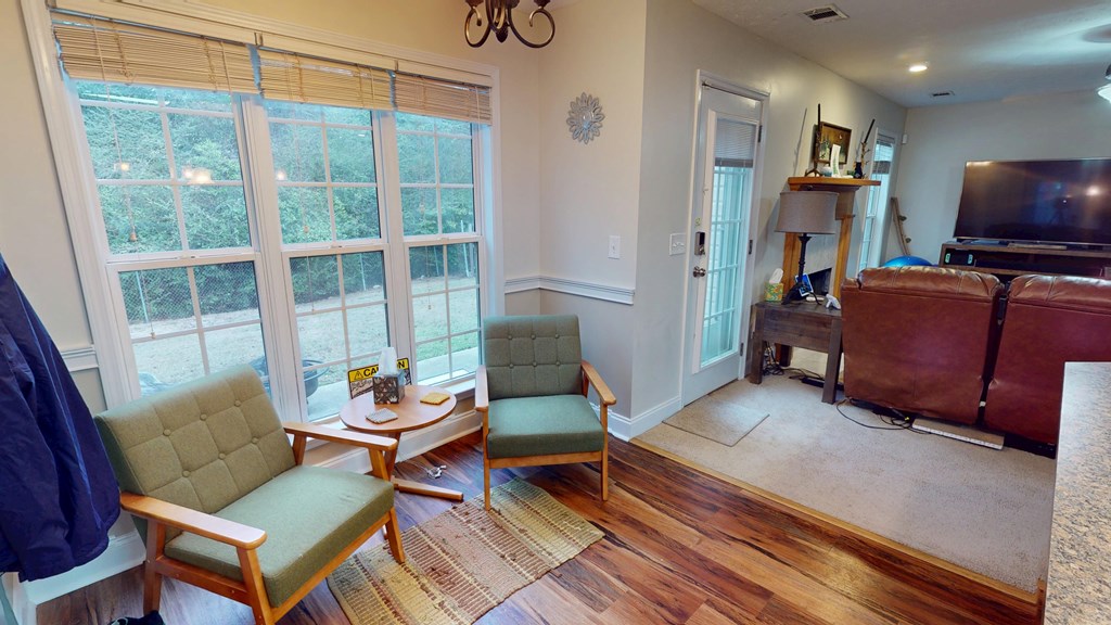 5260 Kingsberry Lane Columbus, GA 31907 - Photo 4 of 23 a living room with furniture and a flat screen tv