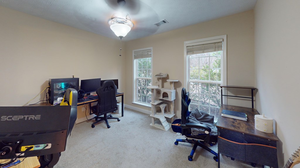 5260 Kingsberry Lane Columbus, GA 31907 - Photo 7 of 23 a view of a workspace with furniture and a window