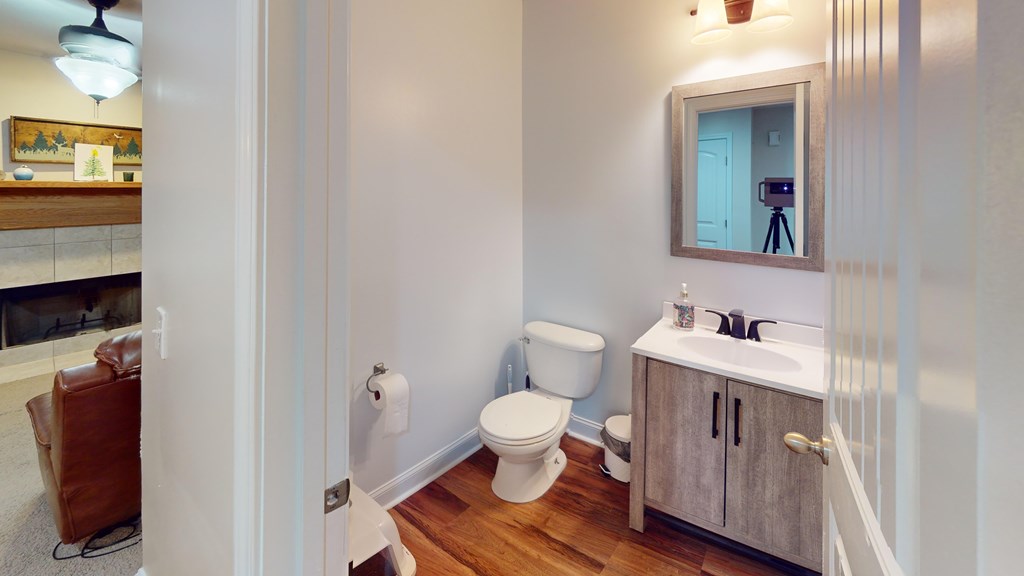 5260 Kingsberry Lane Columbus, GA 31907 - Photo 9 of 23 a bathroom with a sink a toilet and a mirror